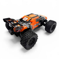 Corally - Punisher XD 4WD 2S Small Scale, RTR Monster Truck, Orange